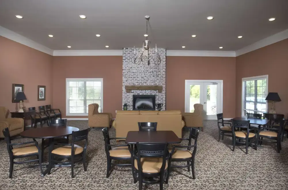 Fireplace and seating, The Claiborne at Thibodaux, Assisted Living in Thibodaux, LA