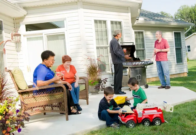 Medical Care — Senior Citizens With Grandkids Playing Outside In Sandy Spring, MD, Rest Assured Living Center