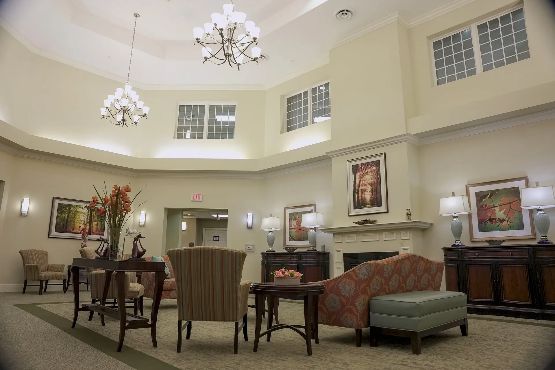 Elegant lounge with fireplace and chandeliers, Harmony at Chantilly, Assisted Living in Herndon, VA