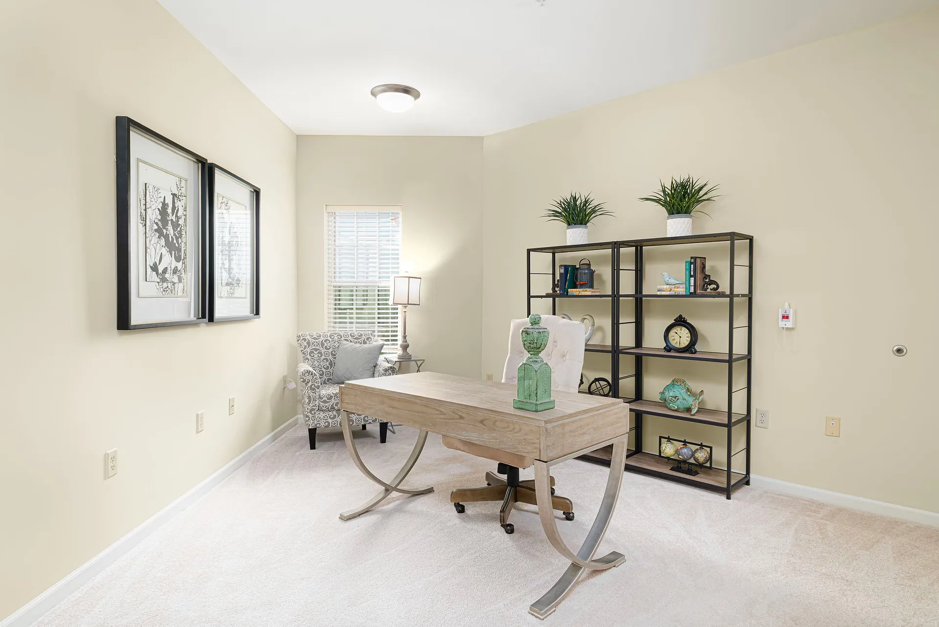 Bright home office with desk and shelving, Harmony at Chantilly, Assisted Living in Herndon, VA